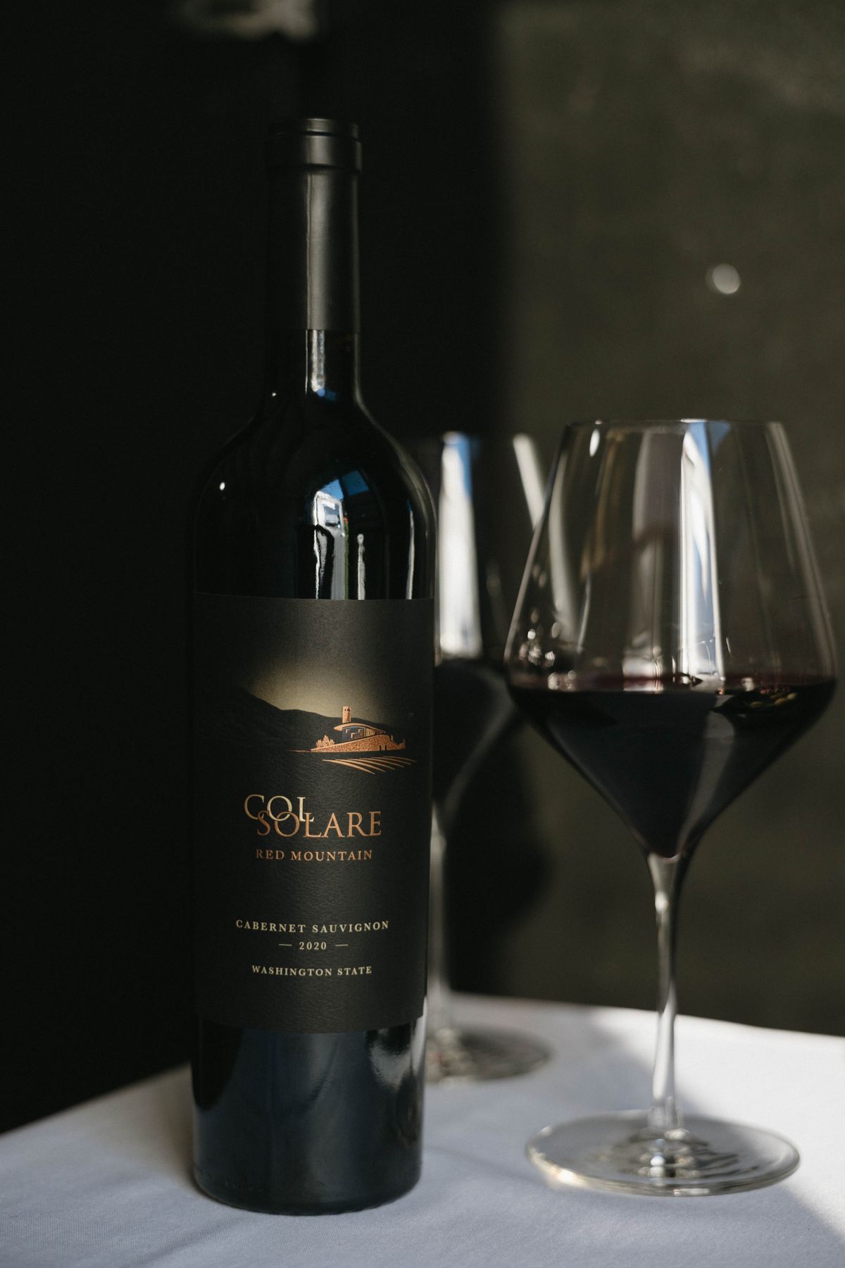Featured Cabernet Sauvignon with a glass of red wine
