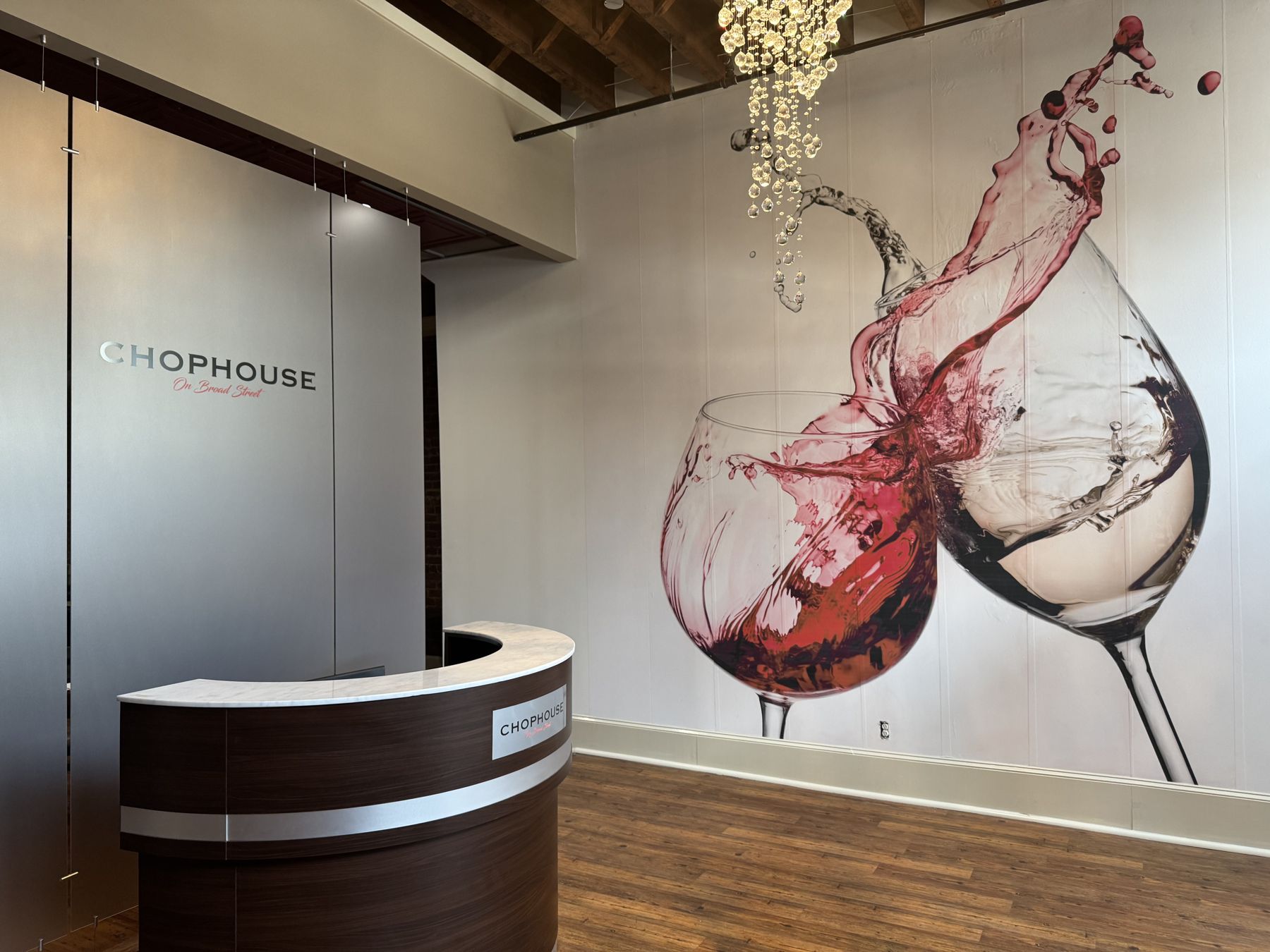 Front lobby with mural and chandelier